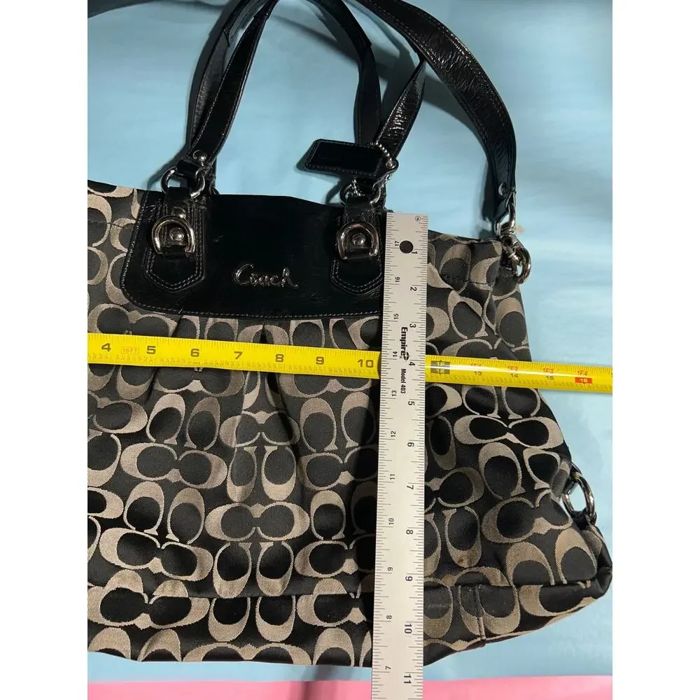 Coach Ashley Signature Canvas Handbag in Black and Gray.